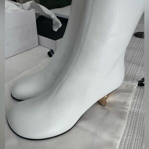 JW ANDERSON White Heeled Boots with iconic Gold Detail.